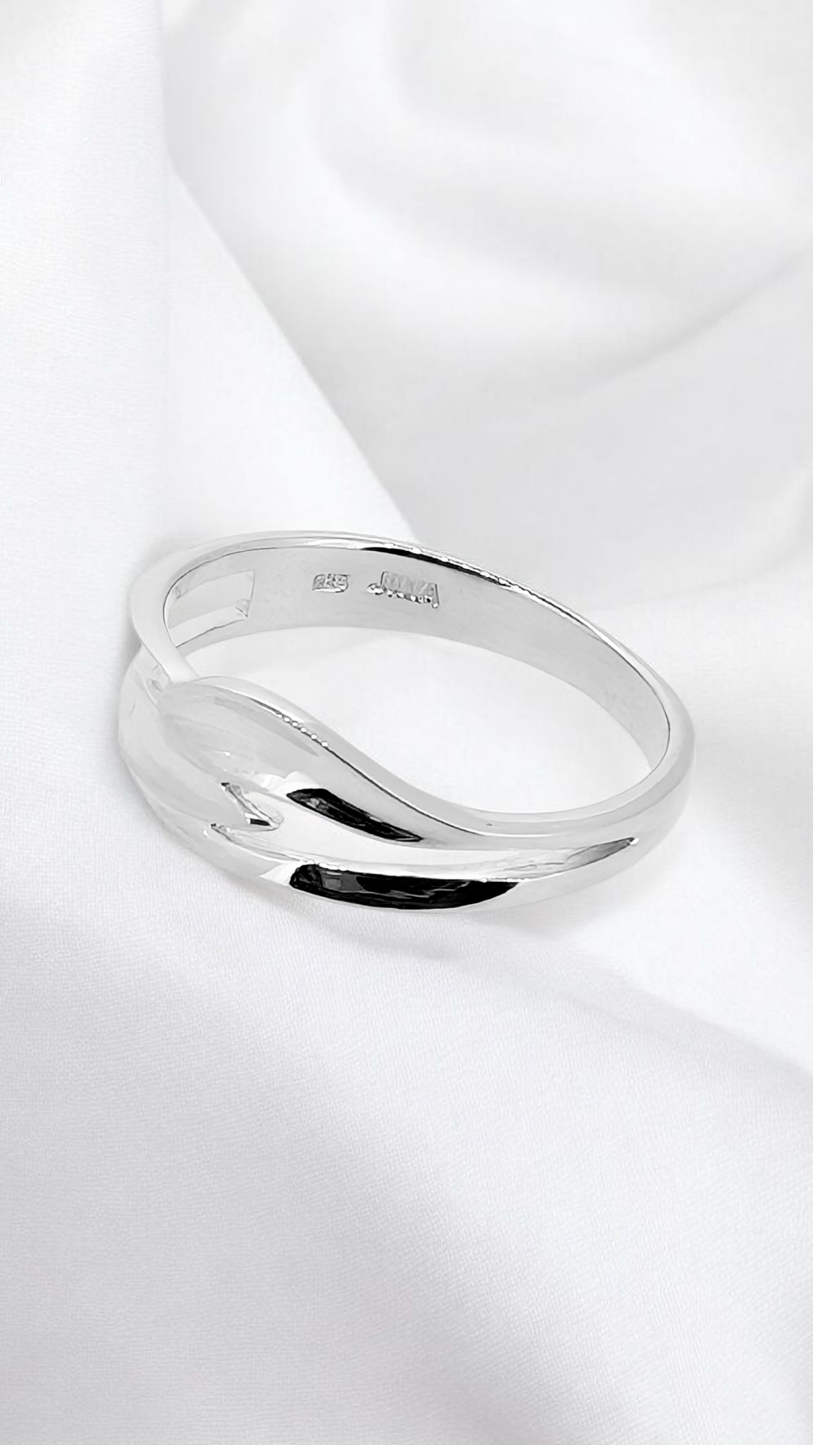 Natural Grace - Sterling silver strands smoothly entwined at the top on this dainty easy wear ring