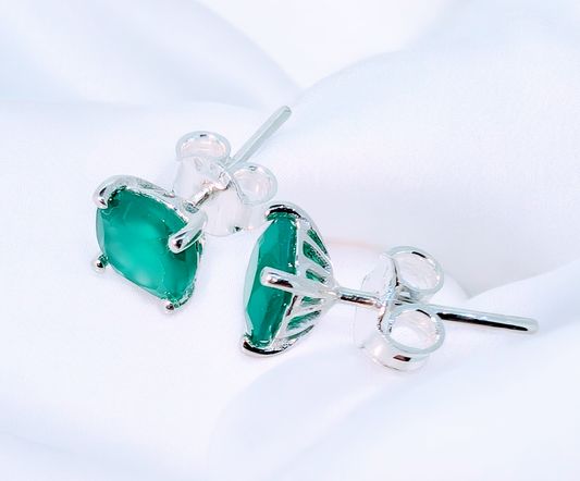 Petite green onyx gemstone sterling silver stud earrings offer a striking pop of colour
