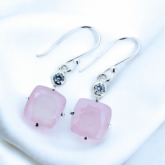 Soothes the heart... does rose quartz.  Sterling silver and rose quartz gem hook earrings with a petite zirc for sparkle